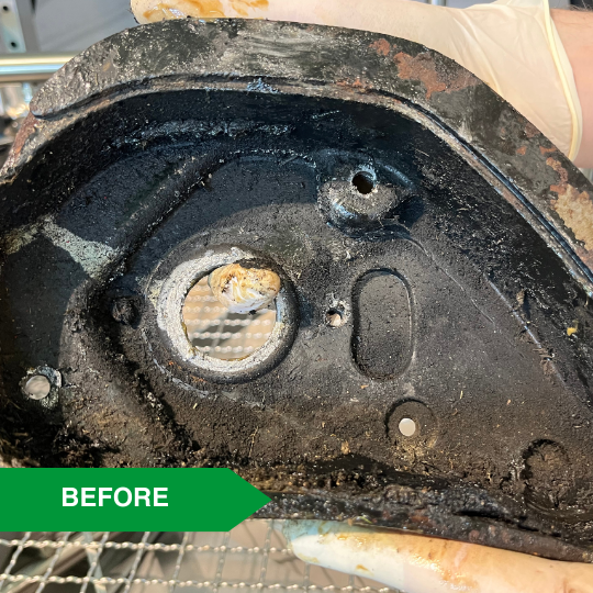 parts of a robotic lawnmower - dirt, oils, greases